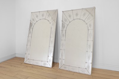 Lot 337 - A pair of Venetian etched and moulded glass mirrors