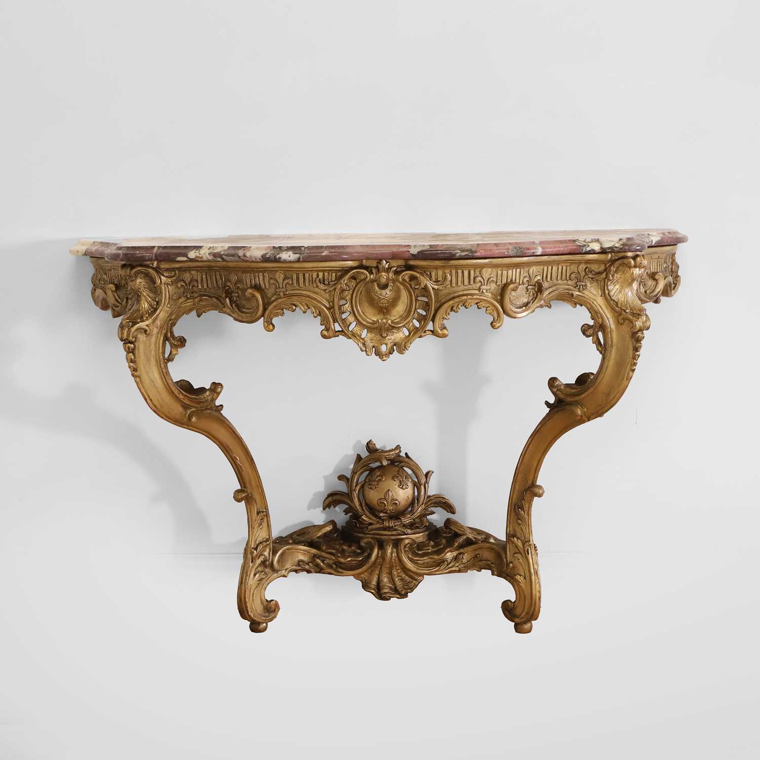 Lot 83 - A Louis XV-style carved giltwood console table
