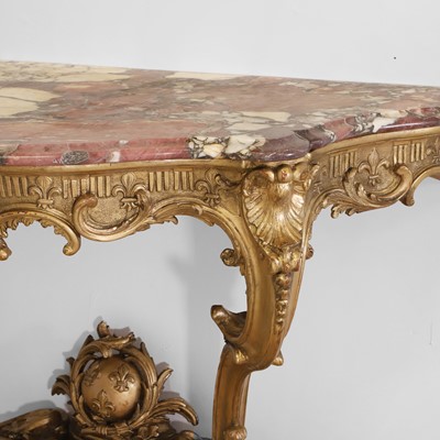 Lot 83 - A Louis XV-style carved giltwood console table
