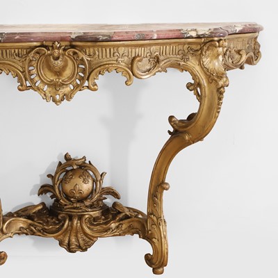 Lot 83 - A Louis XV-style carved giltwood console table
