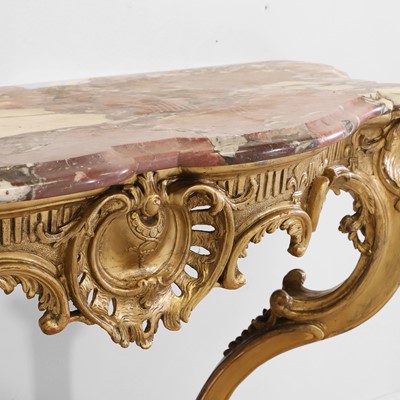 Lot 83 - A Louis XV-style carved giltwood console table