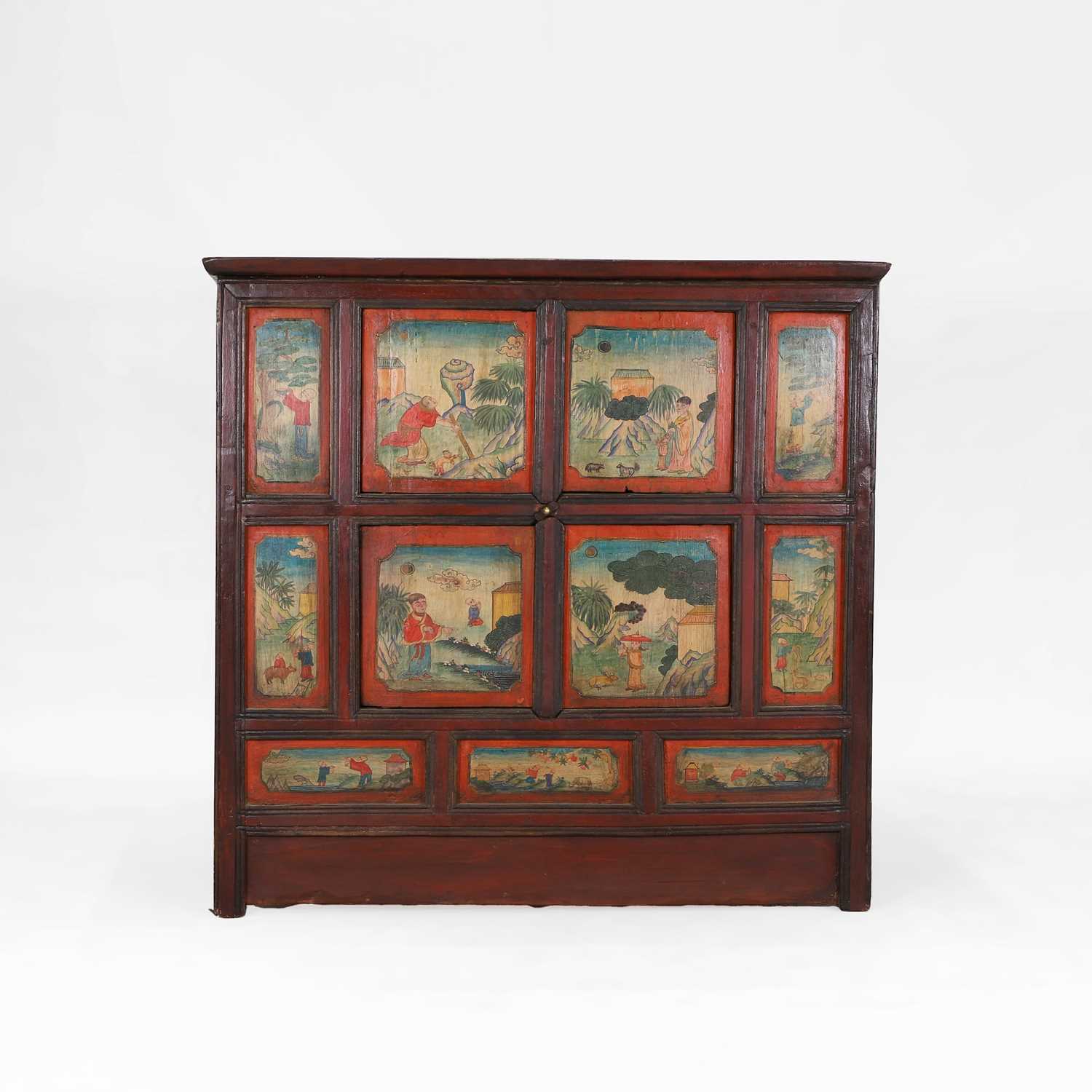 Lot 74 - A painted wooden cupboard