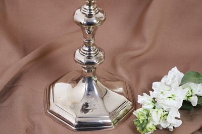Lot 630 - A pair of Queen Anne silver candlesticks