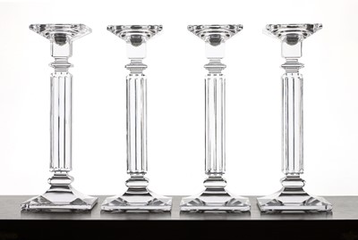 Lot 186 - A set of four contemporary glass candlesticks