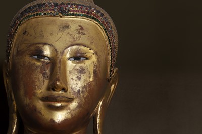 Lot 637 - A very large lacquered and giltwood figure of the standing Buddha