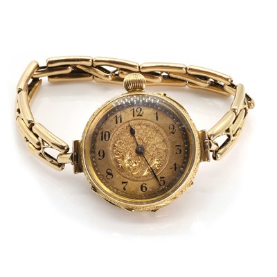 Lot 412 - An 18ct top wind fob/bracelet watch