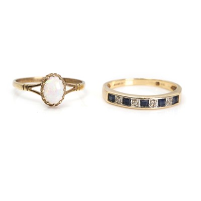 Lot 251 - A 9ct gold opal ring and a sapphire and diamond half eternity ring