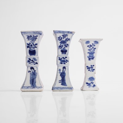 Lot 616 - Three Chinese blue and white gu vases