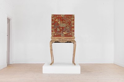 Lot 486 - An export red and gilt-lacquered cabinet