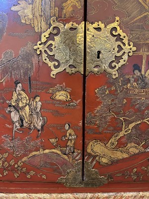 Lot 486 - An export red and gilt-lacquered cabinet