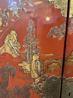 Lot 486 - An export red and gilt-lacquered cabinet