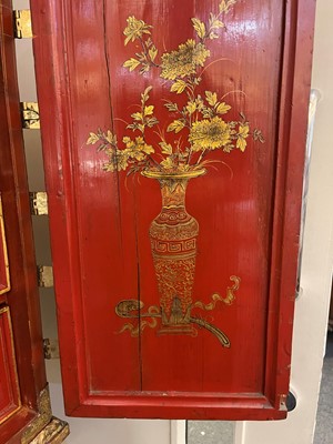 Lot 486 - An export red and gilt-lacquered cabinet