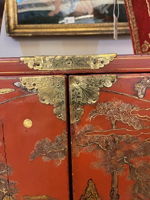 Lot 486 - An export red and gilt-lacquered cabinet