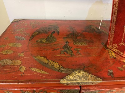 Lot 486 - An export red and gilt-lacquered cabinet