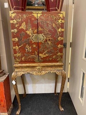 Lot 486 - An export red and gilt-lacquered cabinet