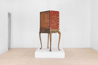 Lot 486 - An export red and gilt-lacquered cabinet