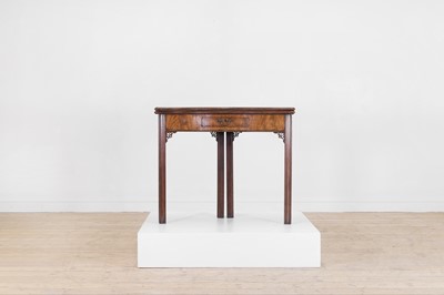 Lot 515 - A George III mahogany serpentine tea table