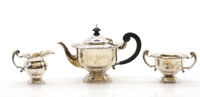 Lot 20 - A silver three-piece tea service