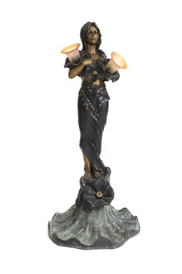 Lot 184 - A spelter figure of a lady
