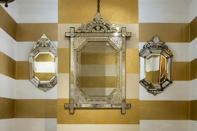 Lot 82 - A Venetian-style etched glass mirror
