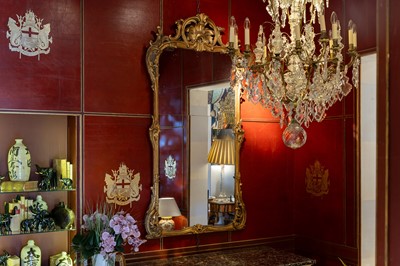Lot 7 - A Louis XV carved giltwood pier glass