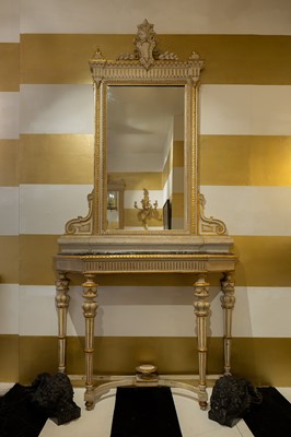 Lot 389 - A pair of neoclassical, painted and parcel-gilt, wooden pier tables