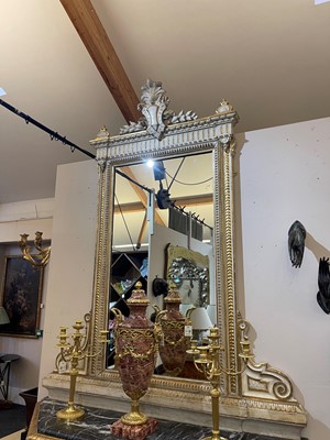 Lot 389 - A pair of neoclassical, painted and parcel-gilt, wooden pier tables