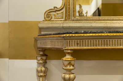 Lot 389 - A pair of neoclassical, painted and parcel-gilt, wooden pier tables