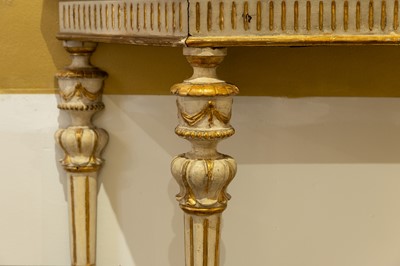 Lot 389 - A pair of neoclassical, painted and parcel-gilt, wooden pier tables