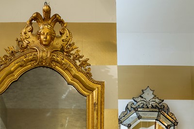 Lot 205 - A giltwood-framed mirror