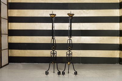 Lot 299 - A pair of gilt wrought-iron church candlestands