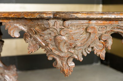 Lot 363 - A pair of rococo silvered console tables