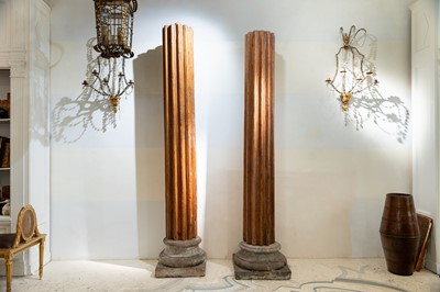 Lot 237 - A pair of fluted teak columns