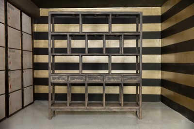 Lot 268 - A provincial elm open shelf