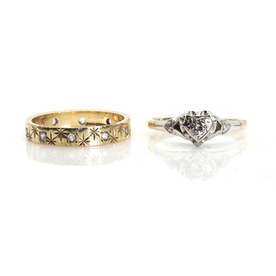 Lot 250 - A single stone diamond ring and a colourless stone ring