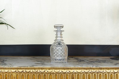 Lot 411 - A Regency cut-glass triple-necked decanter