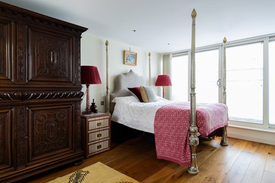 Lot 216 - A nickel silver-clad four-poster bed