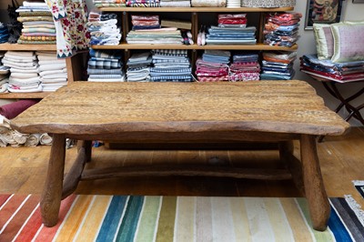 Lot 423 - A carved ash dining table in the style of Alexandre Noll
