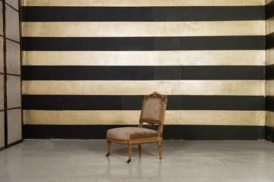 Lot 283 - A Louis XVI-style giltwood slipper chair