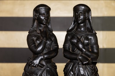 Lot 246 - A pair of Egyptian Revival cast iron female figures