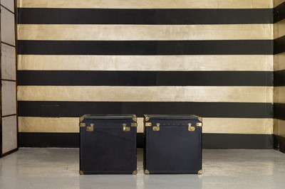 Lot 248 - A pair of black leather and brass-mounted trunks