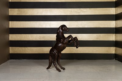 Lot 228 - A leather rearing stallion