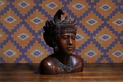 Lot 663 - A carved hardwood bust
