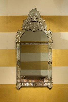 Lot 425 - A baroque etched glass mirror