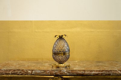 Lot 387 - An amethyst glass pineapple jar