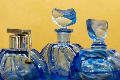 Lot 200 - A three-piece glass scent bottle set