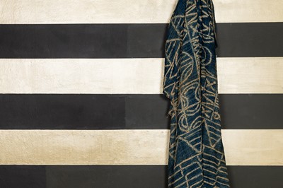 Lot 318 - An indigo-resist-dyed Bamileke ndop cloth