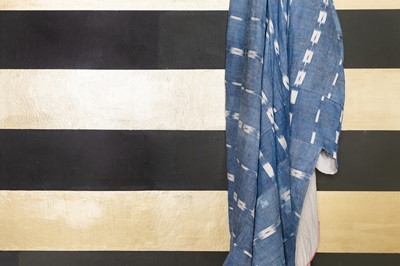 Lot 274 - An indigo-dyed ikat bedspread