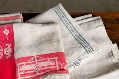Lot 324 - A group of linen tablecloths and tea towels