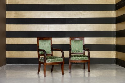 Lot 258 - A pair of Empire carved mahogany armchairs